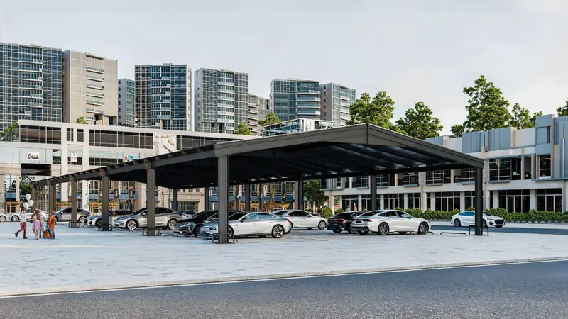 Solarüberdachung über einem großen Parkplatz vor Wohn- und Bürogebäuden