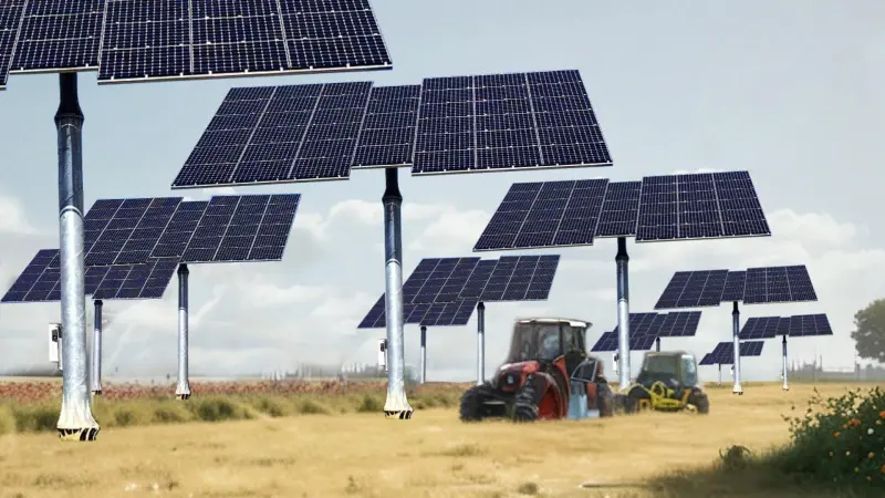 Nachgeführte Solareinheiten auf Masten über einem Feld